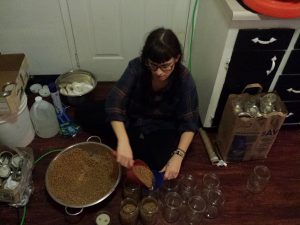 Filling jars with grain