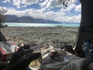 Afternoon lunch of cheese, tomatoes, and wine