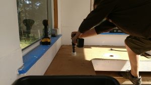 Drilling holes in bench for auto siphon drains