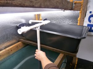 Installation of plumbing pipes into 14 gallon grow beds