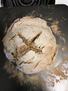 Brown bread on baking sheet