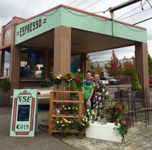 Gaelen’s wife Carrisa Rose Dickson(on left) and business partner Iana Marie Franks(right) displaying their flowers for the first time ever outside Filling Station Espresso.
