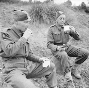 Soldiers-from-the-78th-Division-enjoying-tea-and-cakes-served-by-a-Salvation-Army-van-in-the-forward-area-28-November-1943