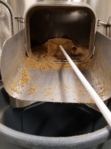 Cleaning the mash tun.
